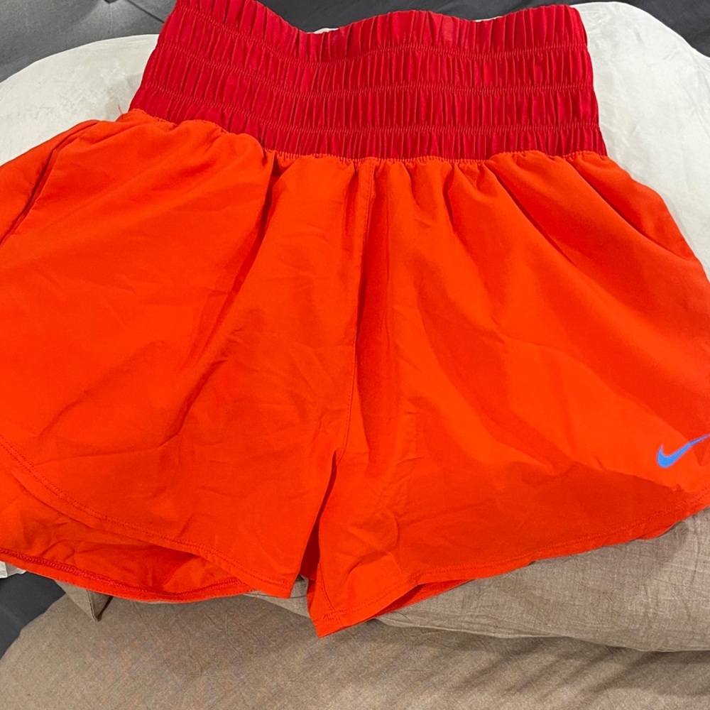 Nike Women's Athletic Shorts in Red and Orange